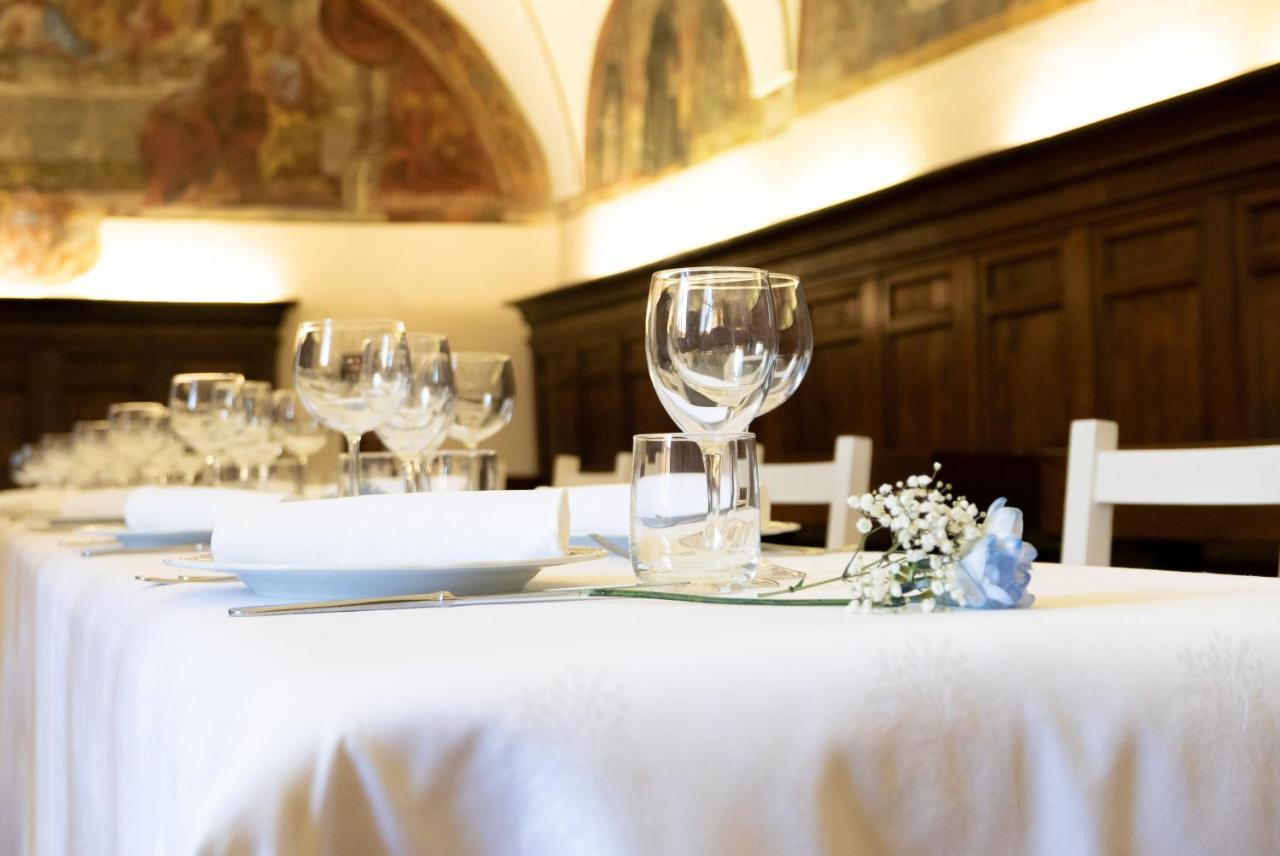 Monastero Ss. Annunziata Hotell Todi Exteriör bild A table set for a meal