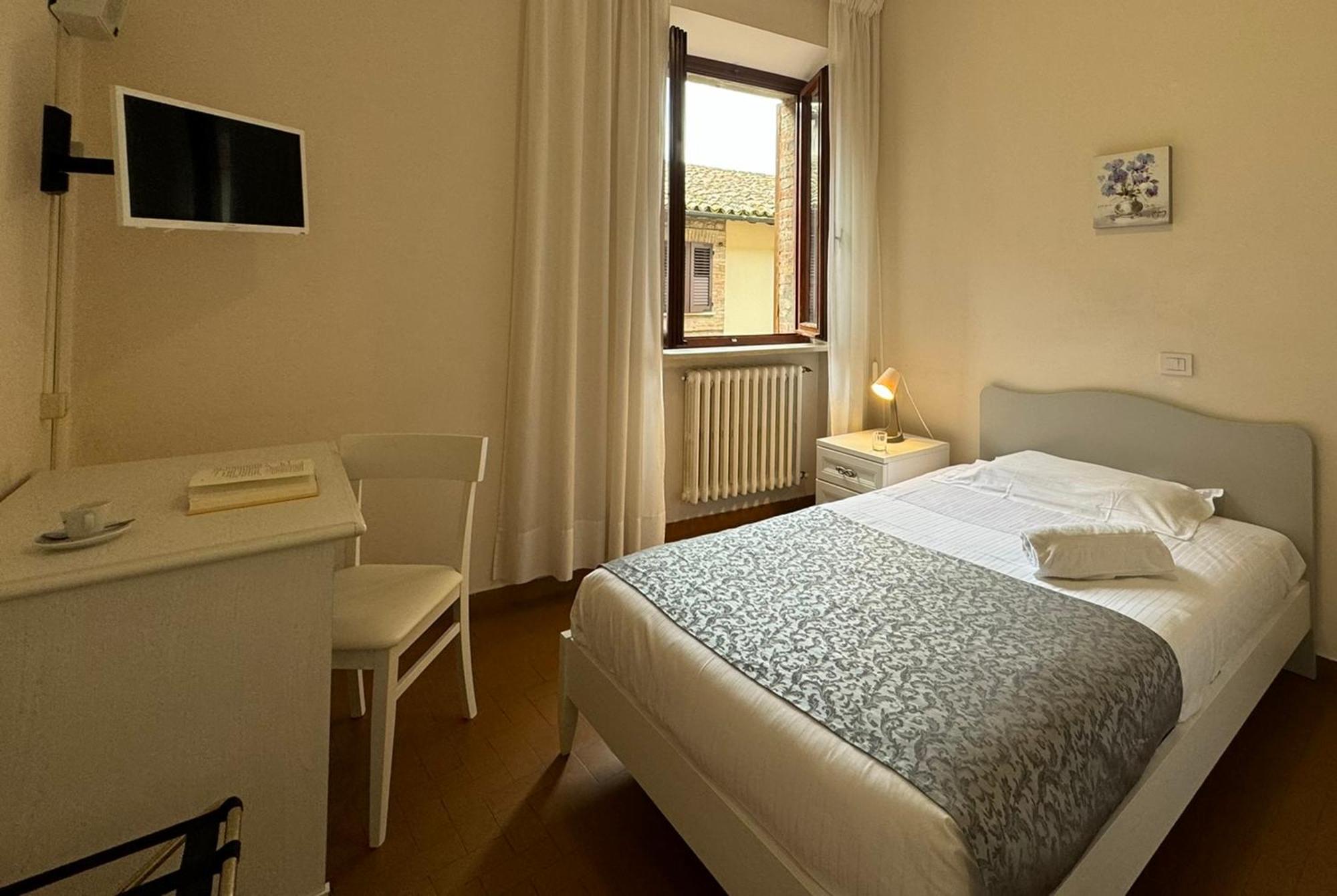Monastero Ss. Annunziata Hotell Todi Exteriör bild A room at the hotel