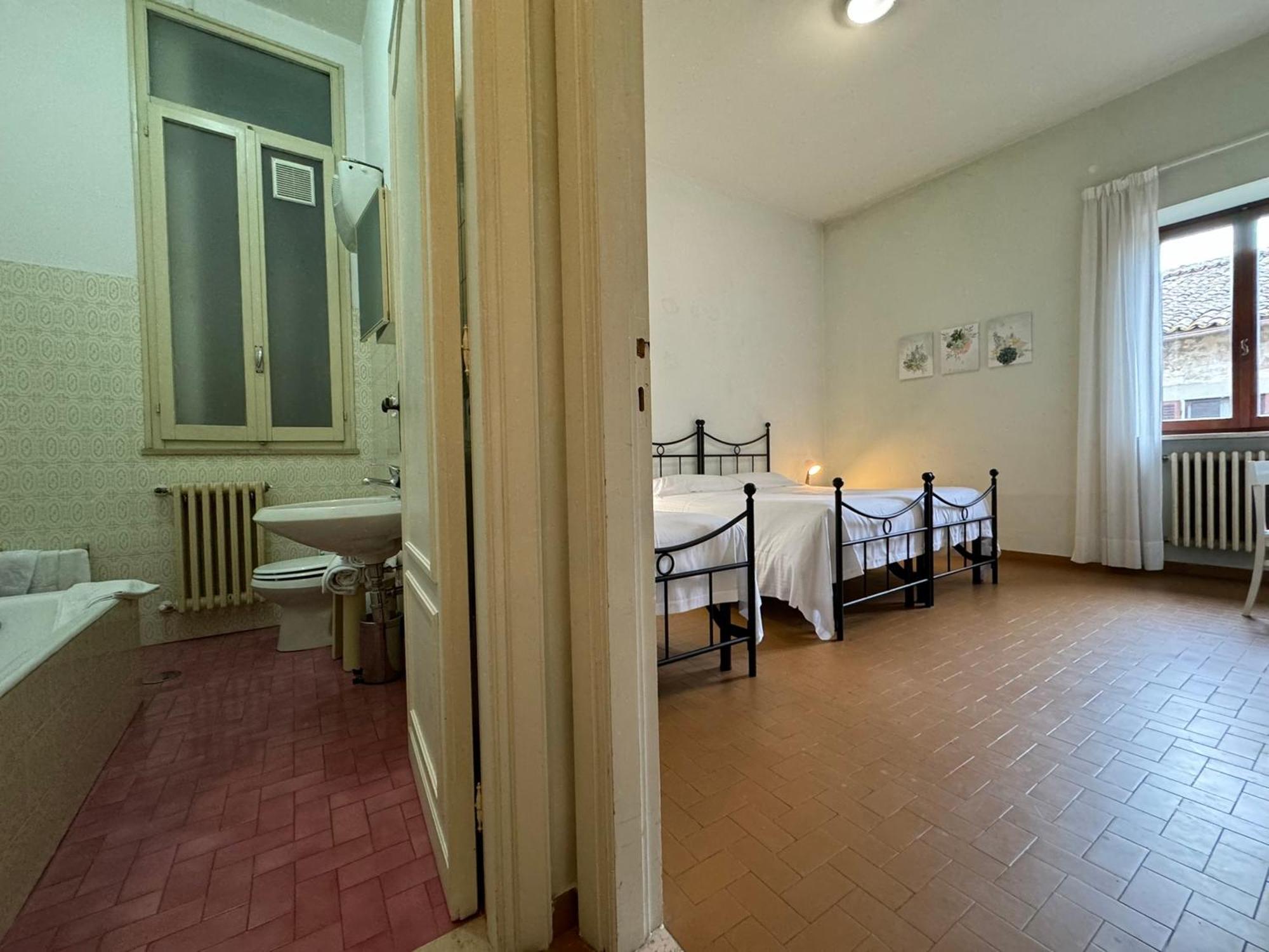 Monastero Ss. Annunziata Hotell Todi Rum bild A typical room at the San Pio X Seminary