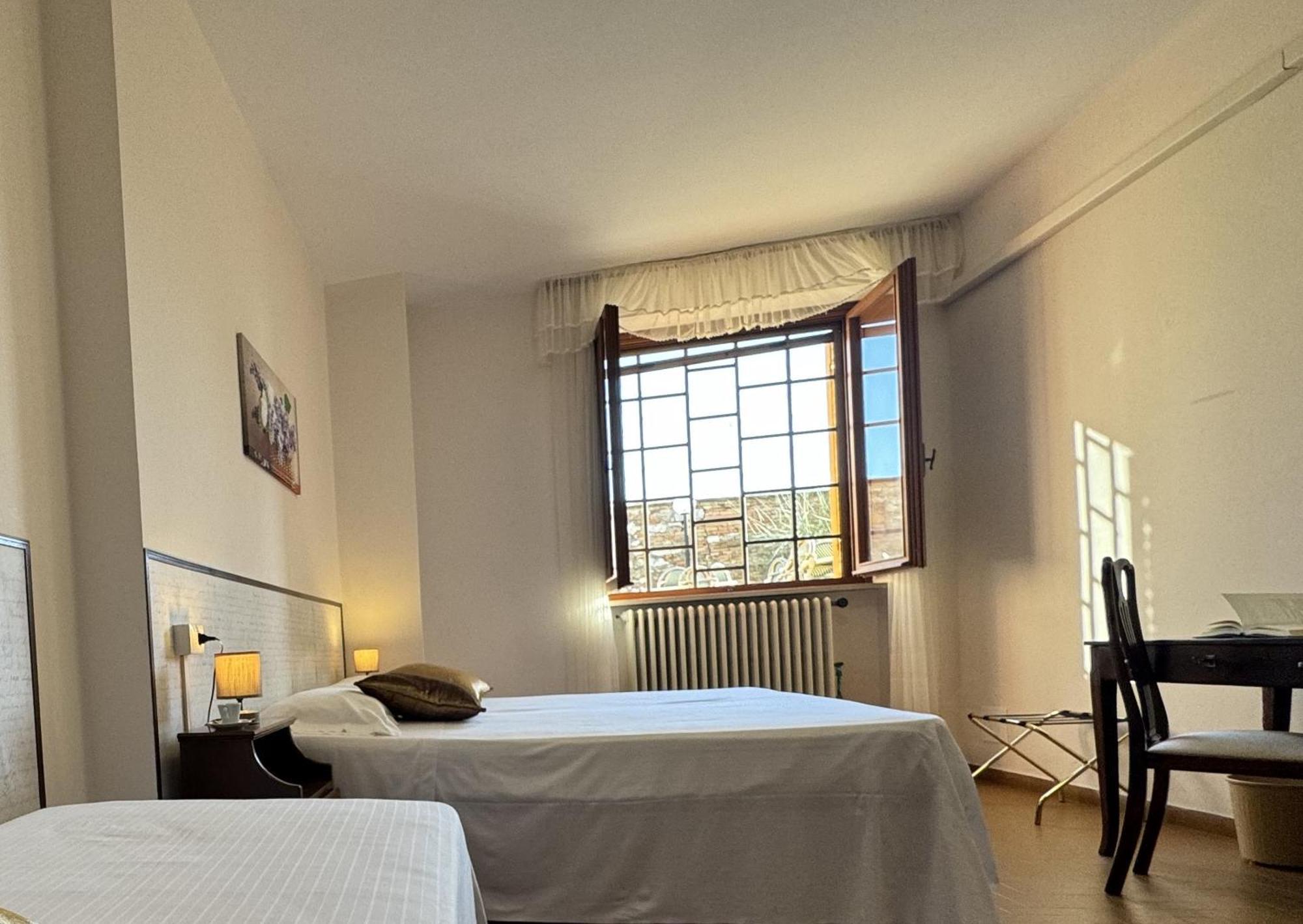 Monastero Ss. Annunziata Hotell Todi Rum bild A room at the hotel