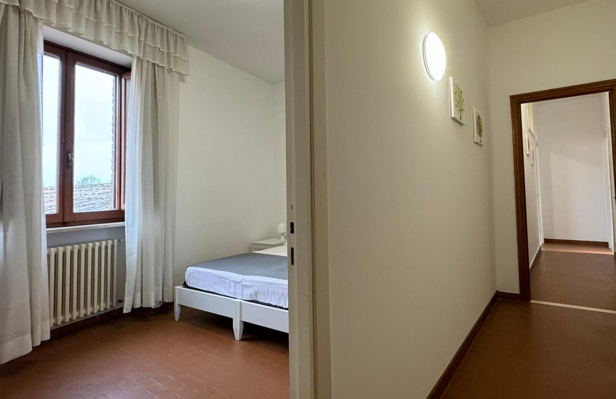 Monastero Ss. Annunziata Hotell Todi Exteriör bild A typical bedroom in the residence halls